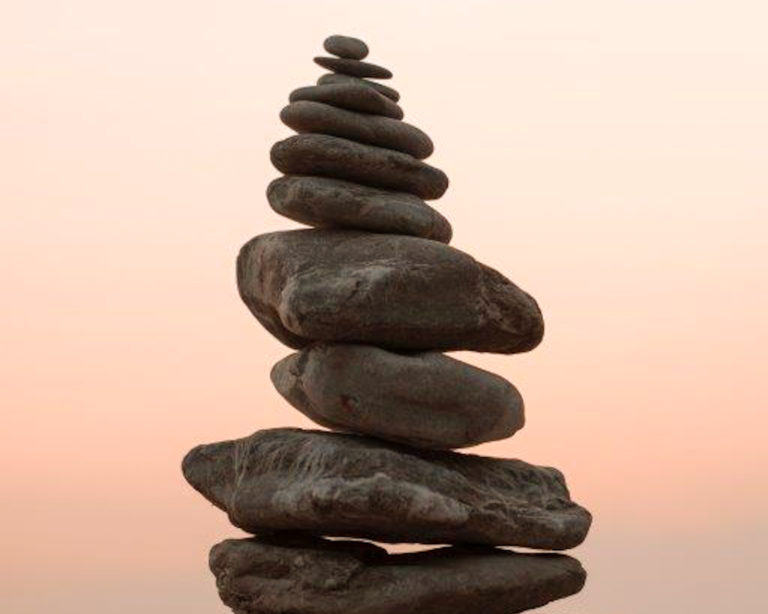 stack of rocks balancing during sunset